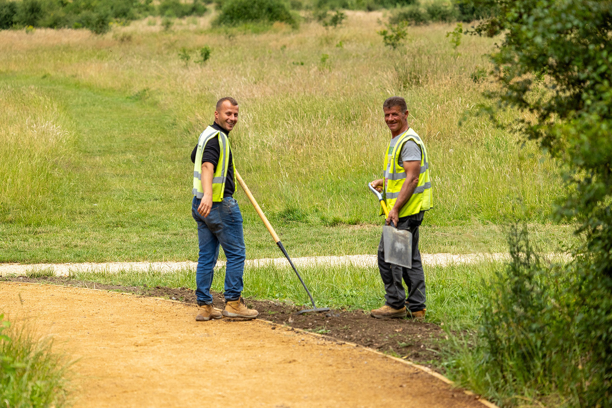 Smiling workmen on the edge